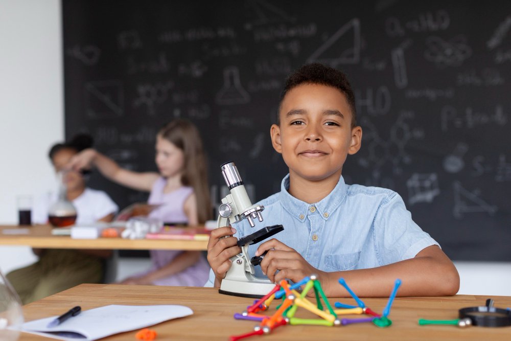 young boy learning more about chemistry class